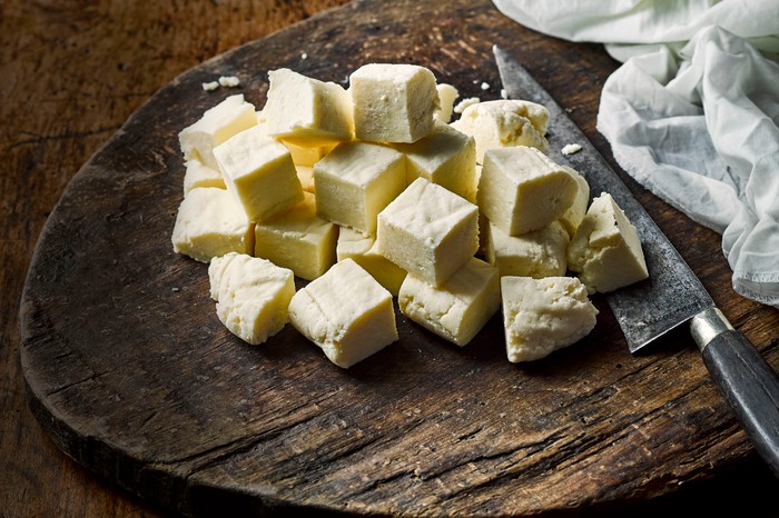 Homemade Paneer on a wooden board